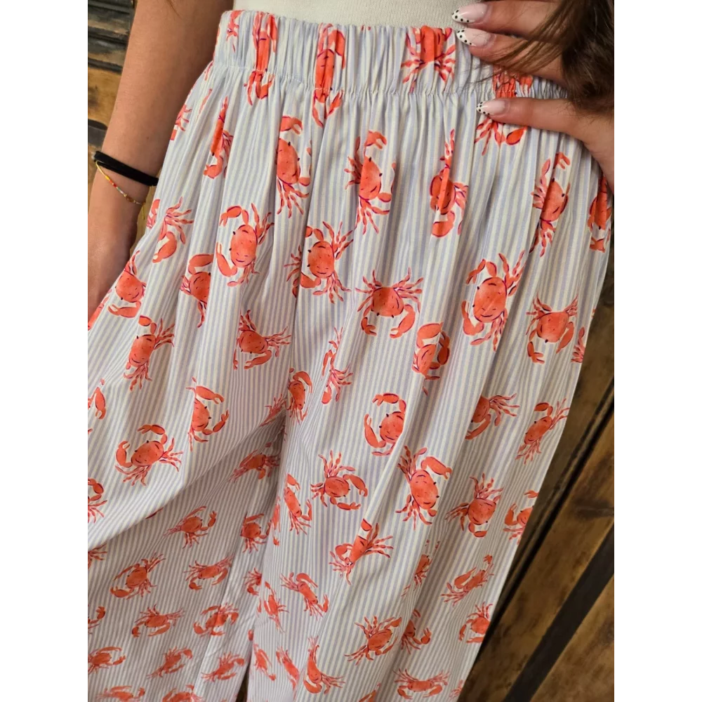 Pantalon fluide en coton bleu rayé et crabes