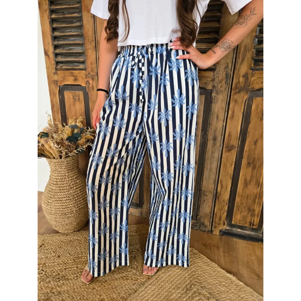 Pantalon fluide en coton bleu rayé et palmiers