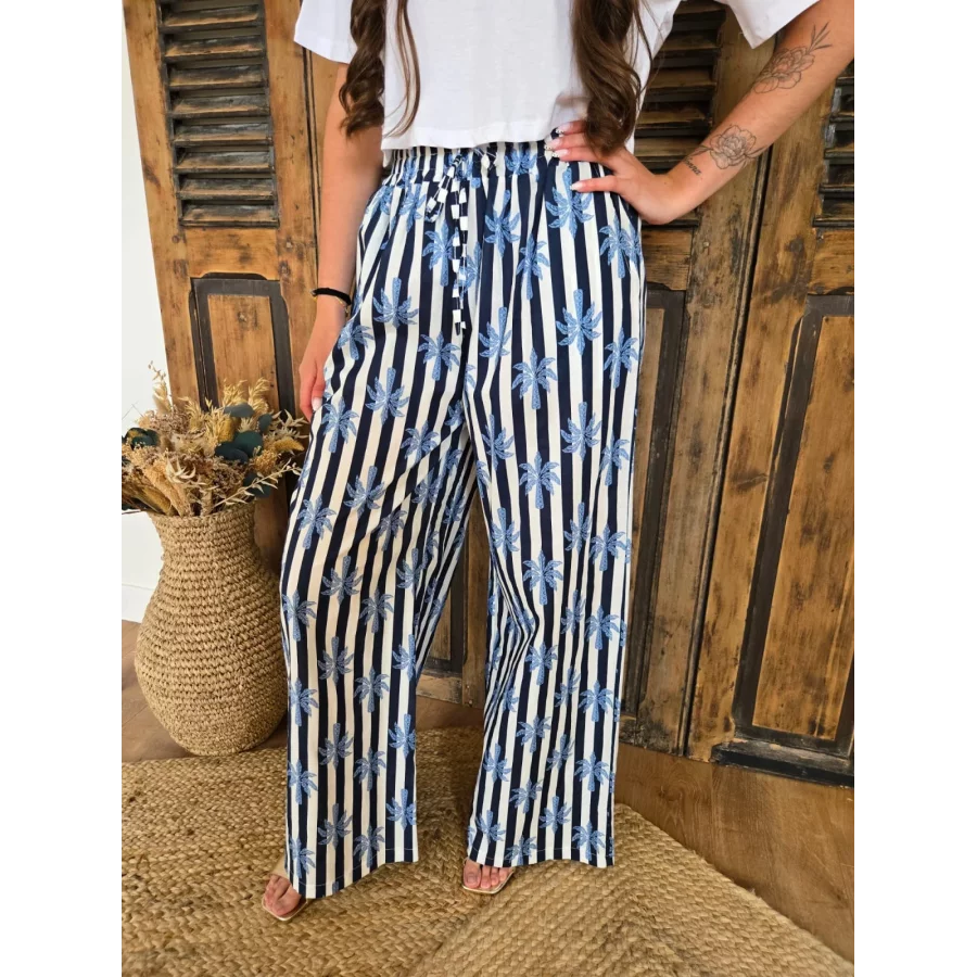 Pantalon fluide en coton bleu rayé et palmiers